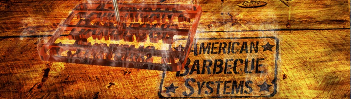 A branding iron that says American Barbecue Systems that has left a fresh brand on a plank of wood.